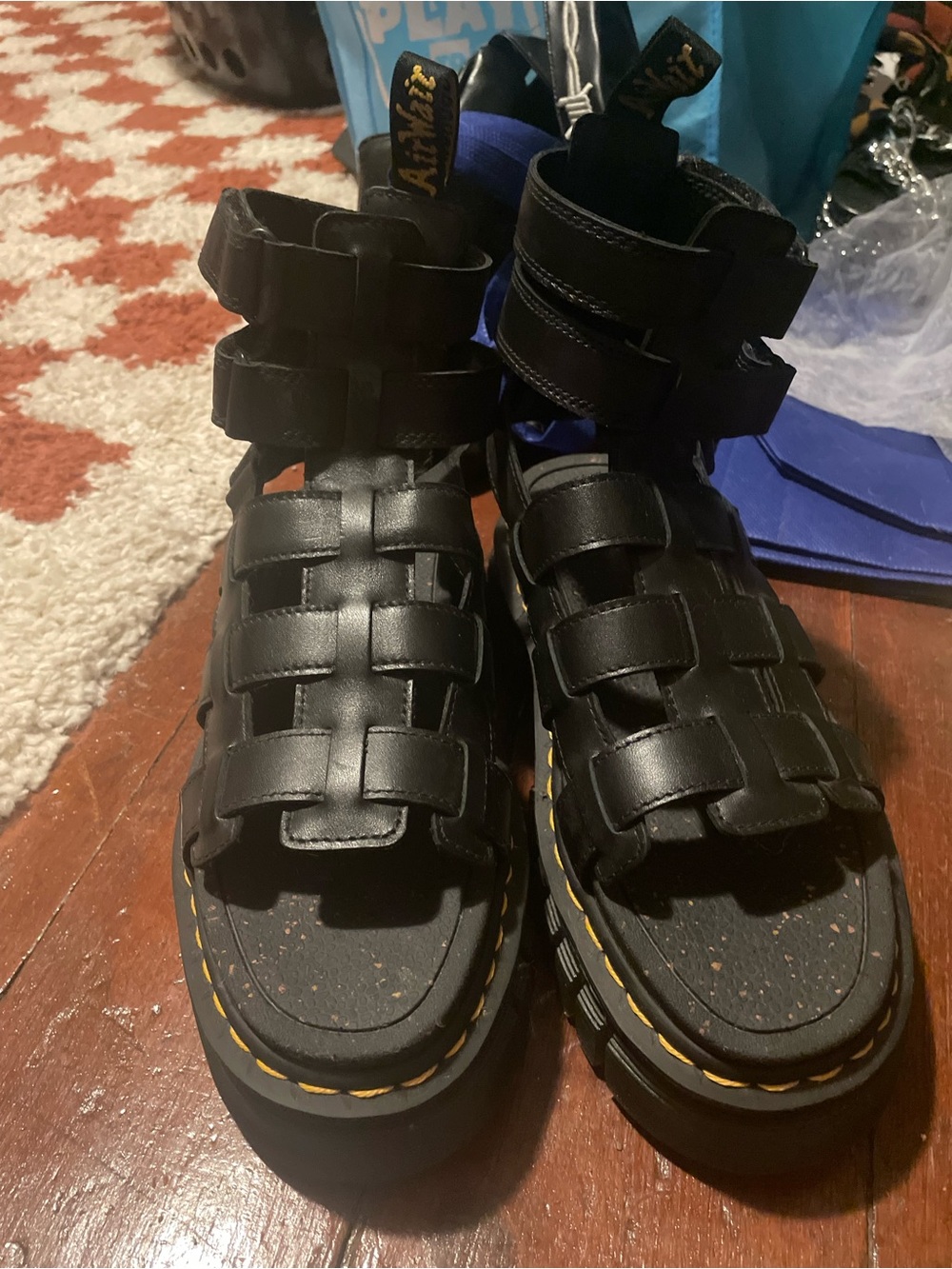 Dr. Martens Black Leather Caged Platform Sandals with Yellow Stitching